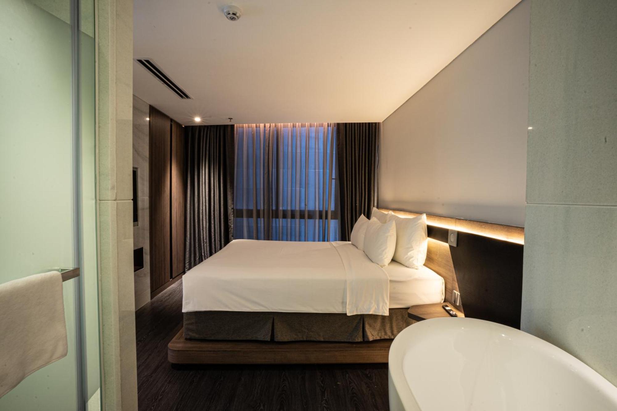 Draco Hotel & Suites Da Nang Quarto foto